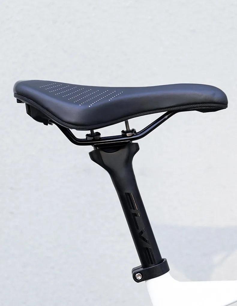 Black and pink mountain bike seat cushion with PU foam padding on bicycle saddle