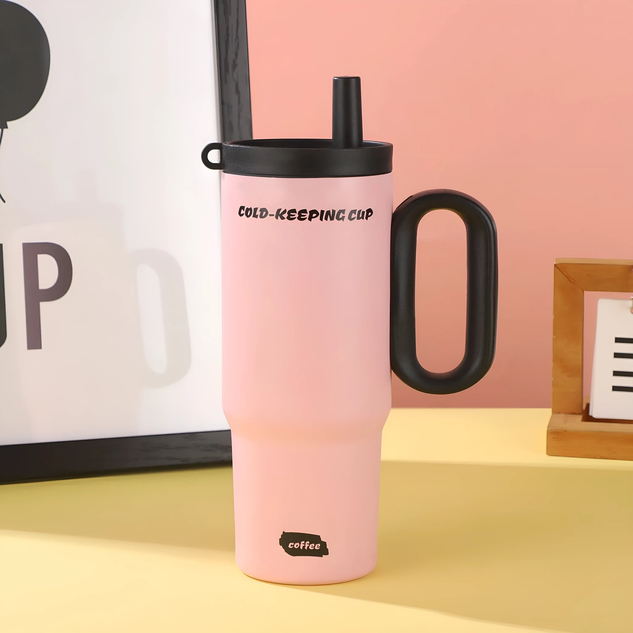 Portable large capacity insulated drink cup with handle in multiple colour options.
