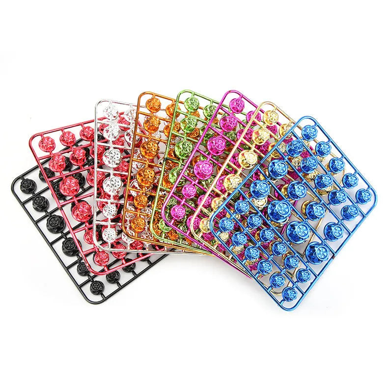 Set of 30 coloured ABS plastic motorcycle screw covers for engine customisation.