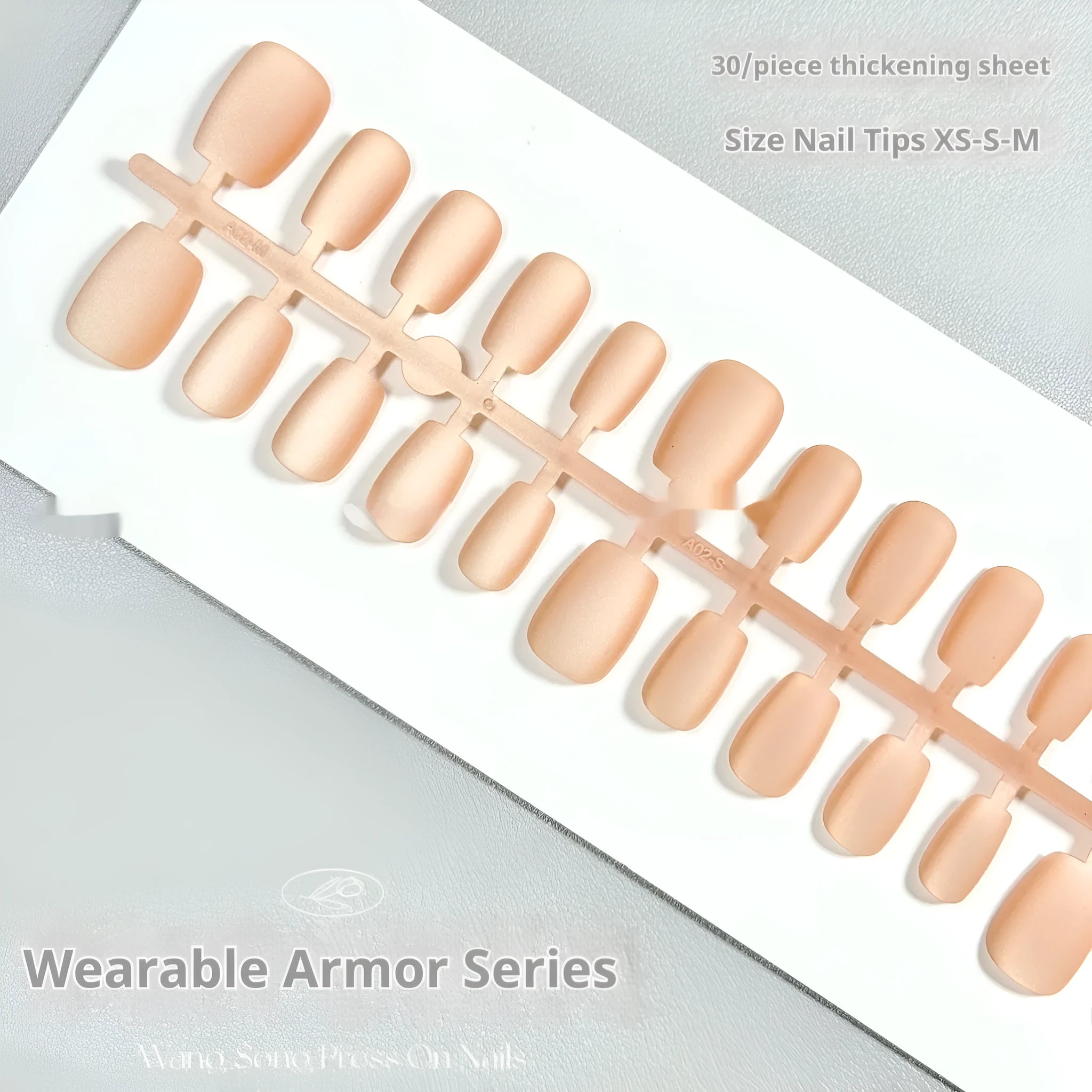 Frosted velvet Cat's Eye effect artificial nails in short ladder sizes on a display card.