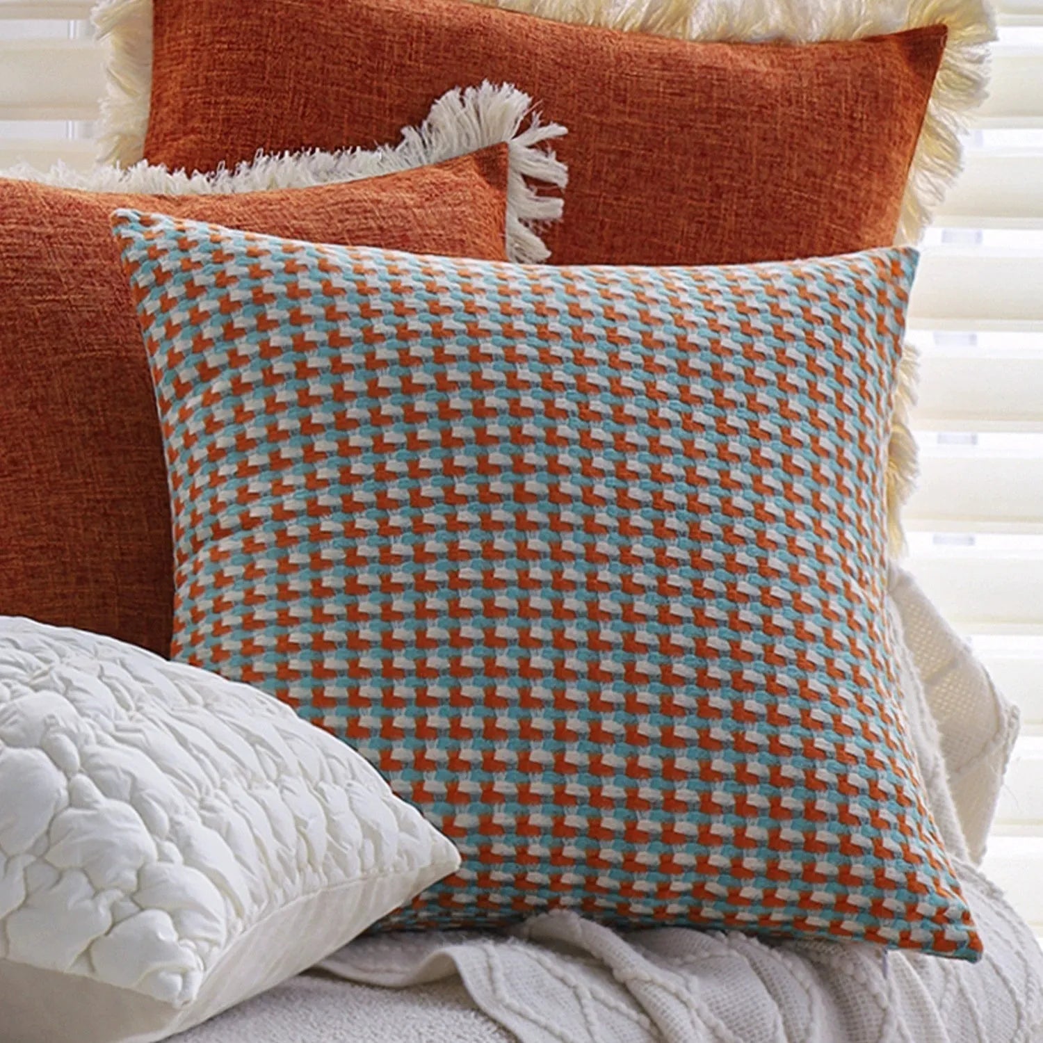 Modern minimalist 45x45cm yarn-dyed Tihua cushion cover with geometric abstract pattern in colourfast orange