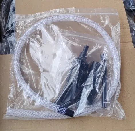 Eight small vacuum cleaner suction head accessories laid out, part of a multifunctional tool set for portable cleaners.