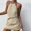 Women's solid colour linen A-line summer dress on hanger showing midi length and casual design