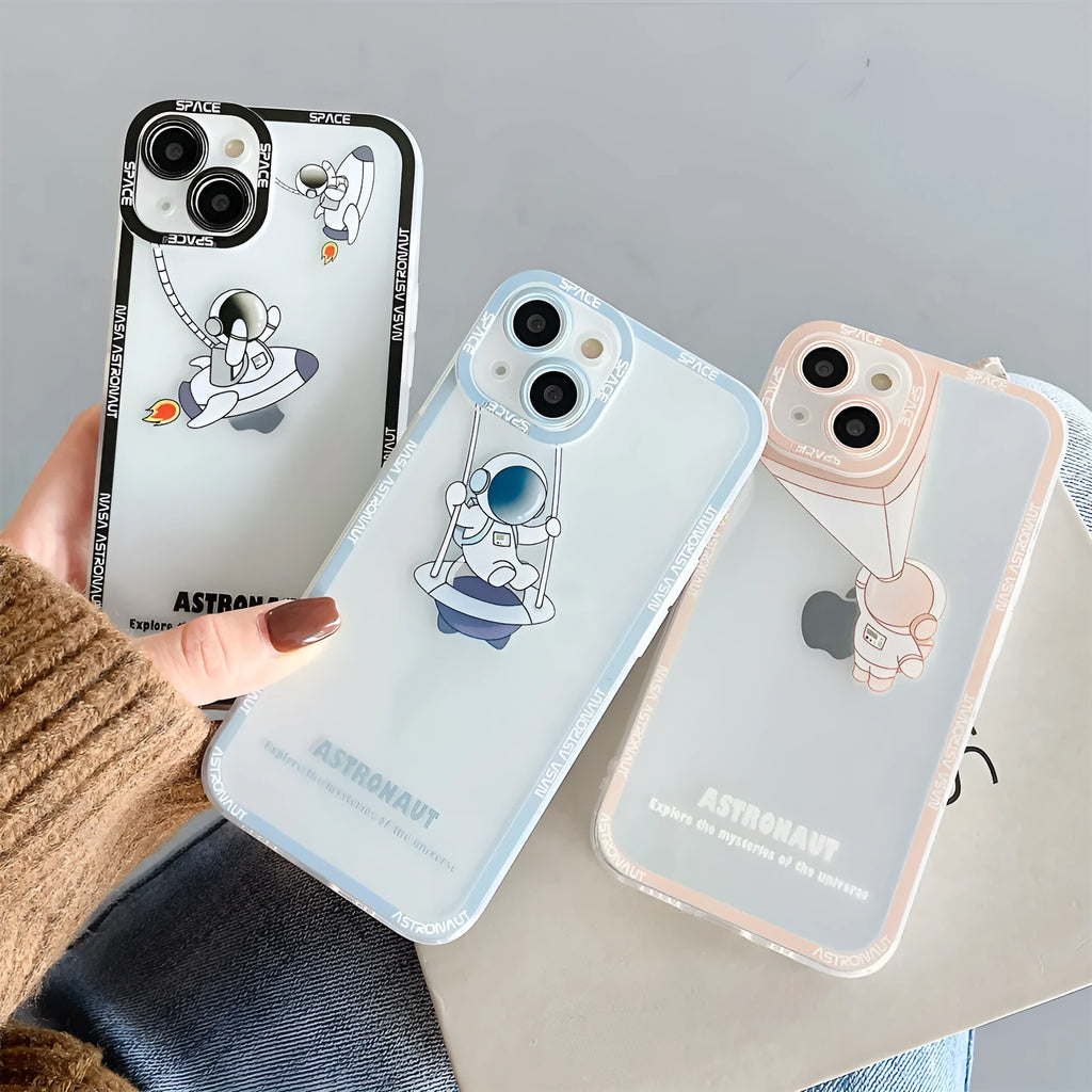 Transparent silicone phone case with blue astronaut print showing through clear background on iPhone