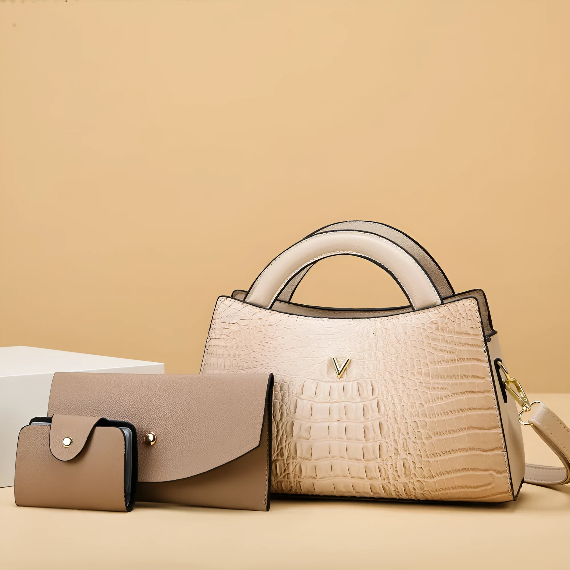 Women's black crocodile pattern PU crossbody handbag showing zip compartments and single shoulder strap.