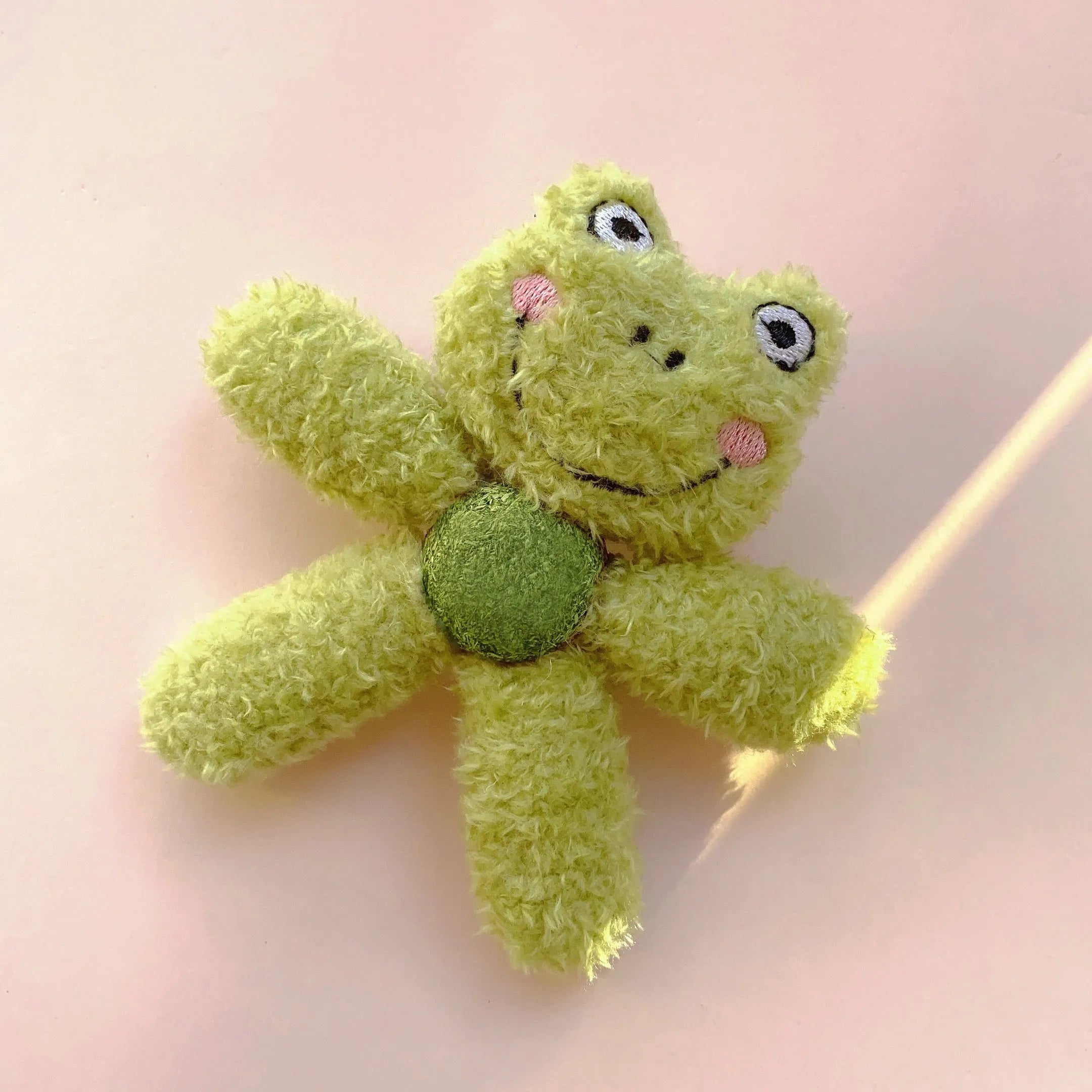 Catnip chewing ball toy in animal designs for dental cleaning and interactive play