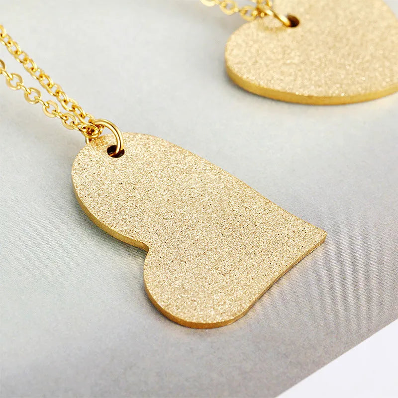 Women's simple geometric heart-shaped titanium steel necklace pendant, colour KN25736-Z.