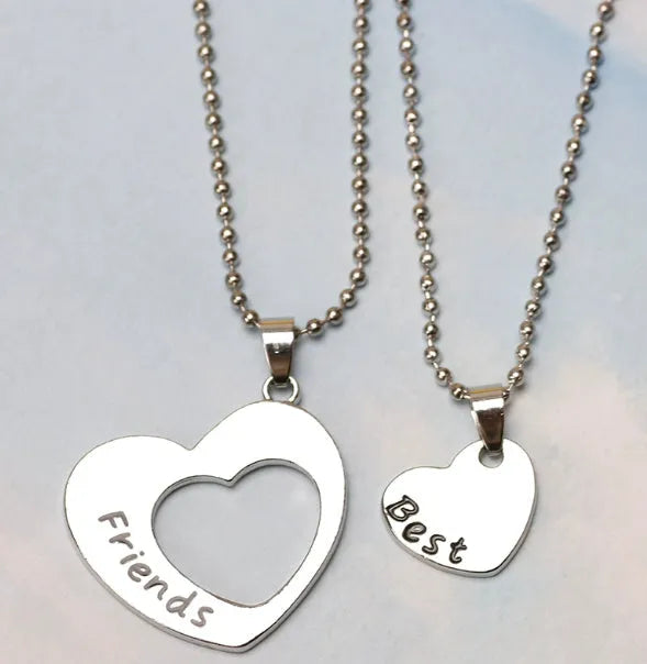 Two silver heart-shaped alloy puzzle necklaces on a cross chain, set of two, women's jewellery