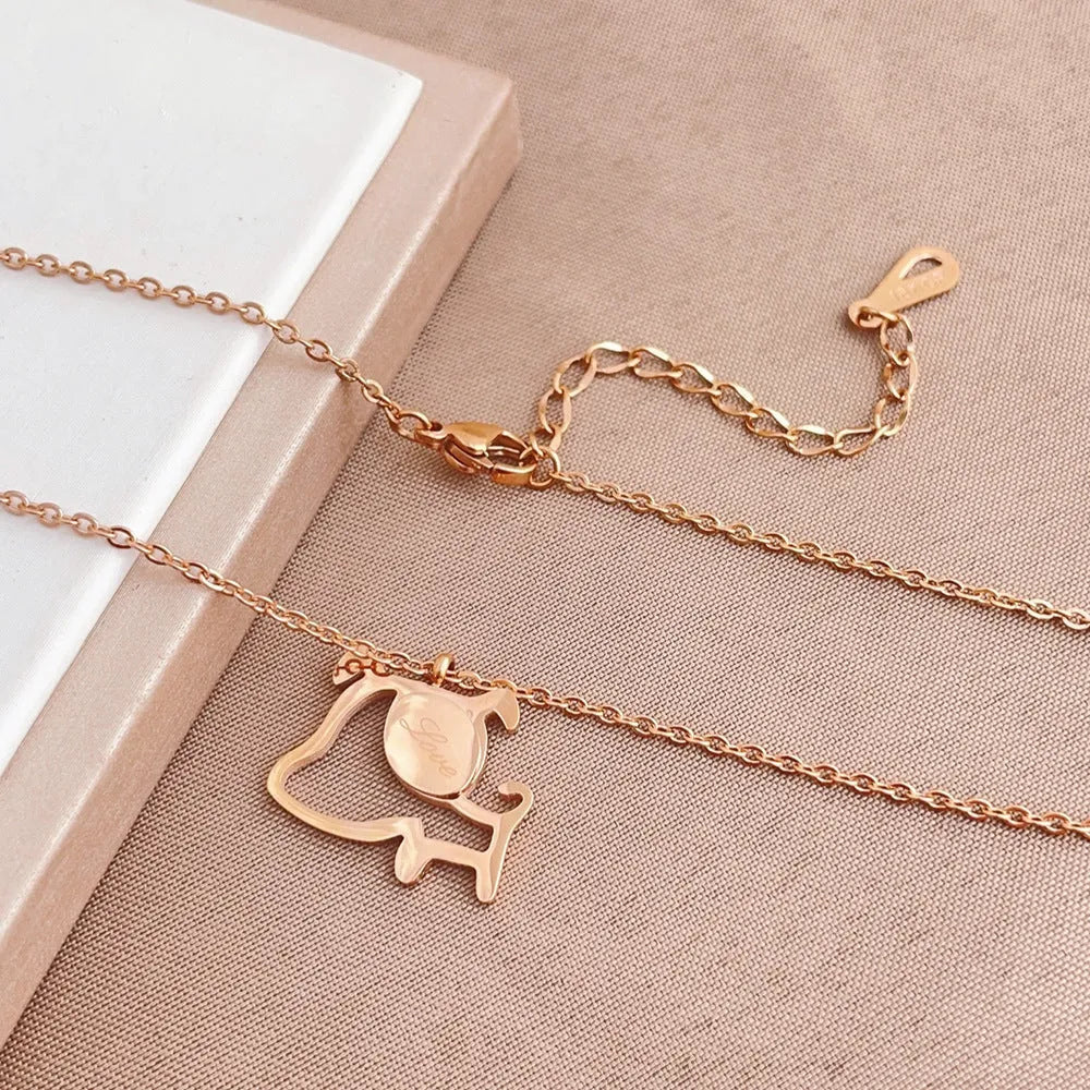Rose gold titanium steel clavicle chain necklace with geometric line design on white background