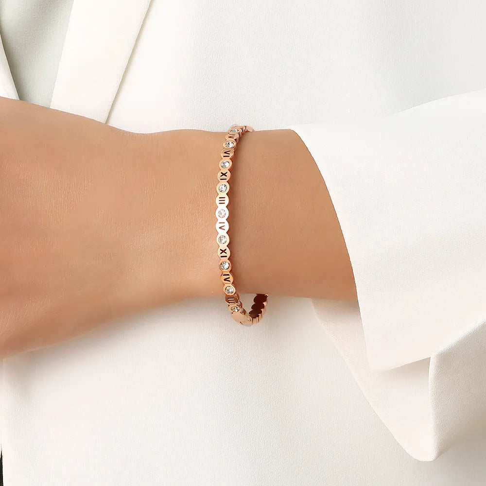 Titanium steel Korean style bracelet with numeric elements in gold, rose gold, or steel colour.