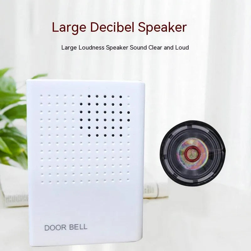White wired dingdong doorbell 87x62x23mm on a wooden door frame