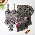 Leopard print women's backless one-piece swimsuit with mesh dress and pants.