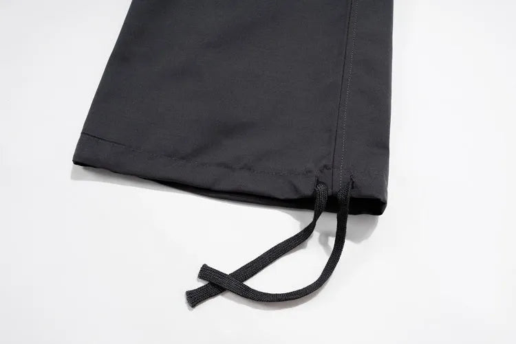 Multi-pocket contrast zip casual baggy pants in dark grey cotton with loose fit and mid waist