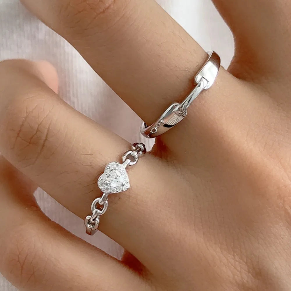 925 silver couple ring with diamond detail and adjustable opening, geometric shape with heart and chain motifs