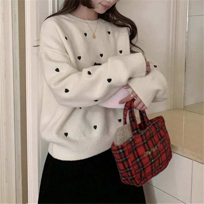 Women's loose fit acrylic pullover sweater with crew neck, long sleeves, and love-pattern embroidery