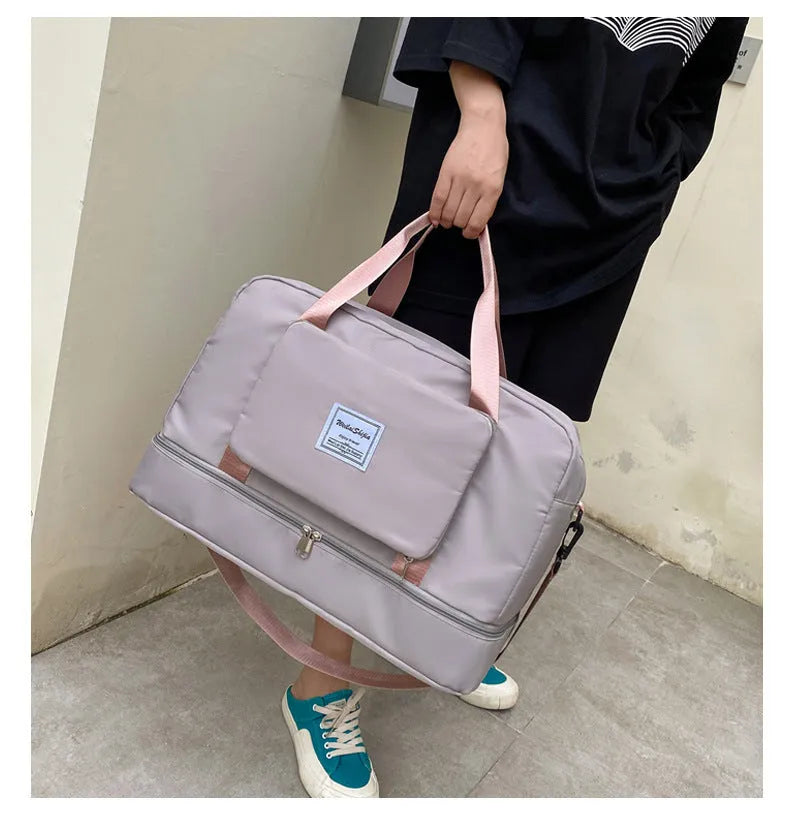 Foldable Oxford cloth travel duffel bag for women with zipper pockets and dry wet separation in purple