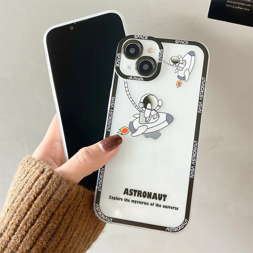 Transparent silicone phone case with blue astronaut print showing through clear background on iPhone