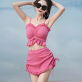 Women's solid colour milk silk bikini swimsuit top and pants set.