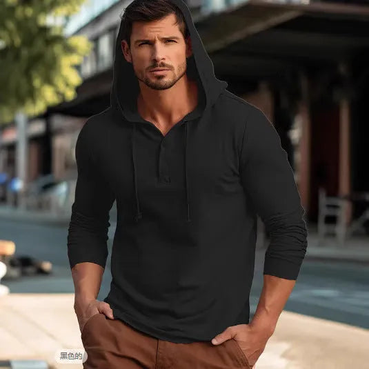 A dark blue cotton pullover hoodie with long sleeves on a hanger.
