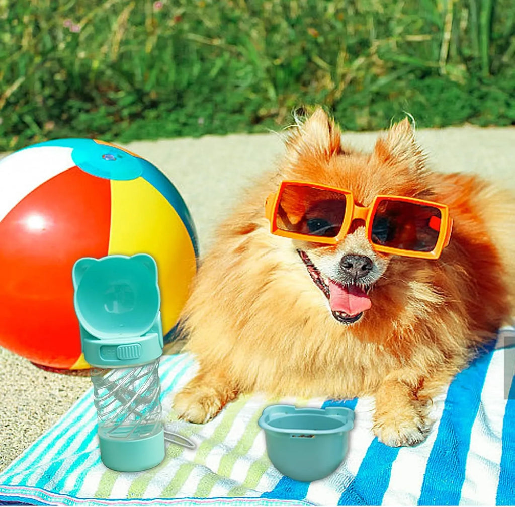 Green, pink, or white 3-in-1 portable pet water bottle with food container and bag dispenser.