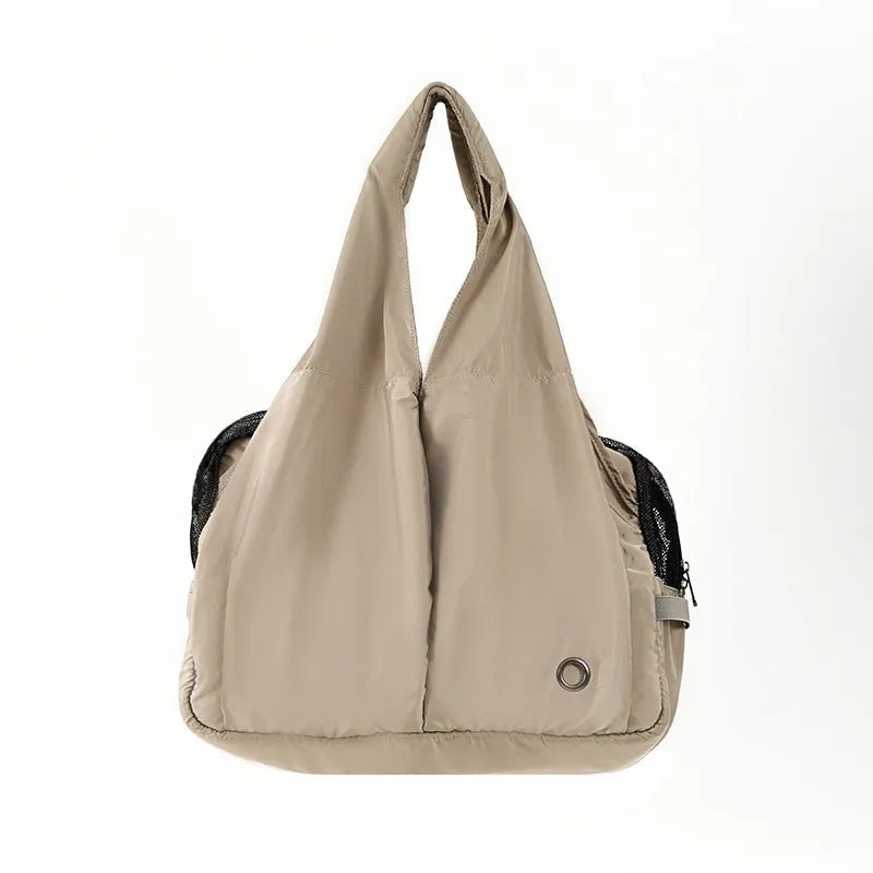Apricot-coloured cloth pet handbag measuring 41x16x28cm with carrying handles