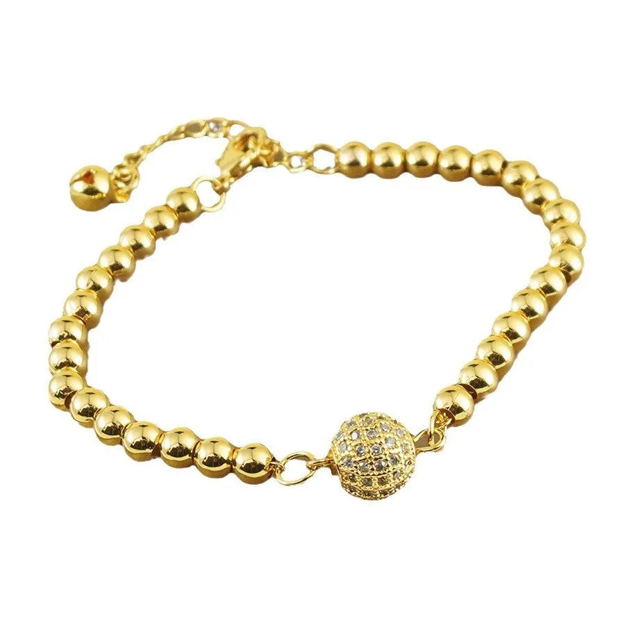 Women's Arabic-style copper bracelet with a heart shape and single zircon ball accent.