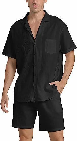 Man wearing a grey flax linen short-sleeved top and matching shorts from the summer sports suit set.