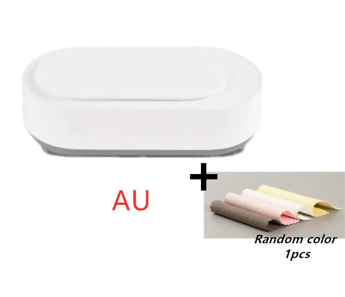 White portable ultrasonic cleaner with stainless steel tank and a single control button.