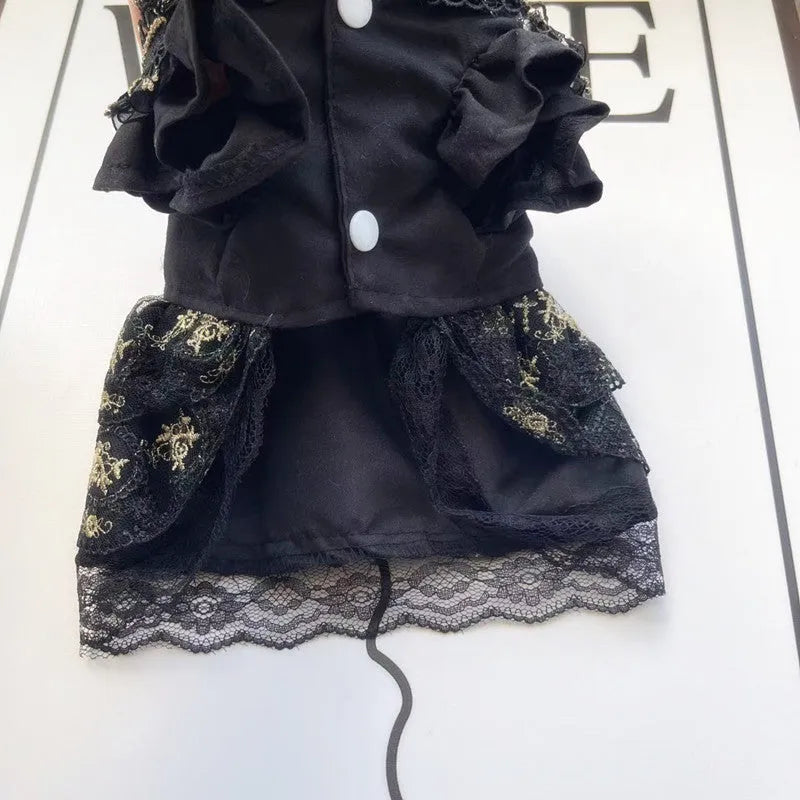 Golden tiered gothic-style skirt for a small dog on a mannequin, showing princess design.