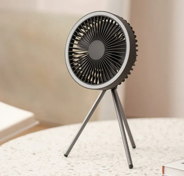 White USB rechargeable camping fan on aluminium tripod showing front view