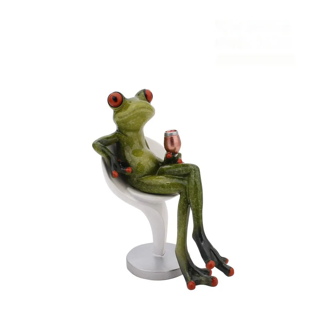 Pastoral style green resin frog decoration figurine on a wooden shelf.