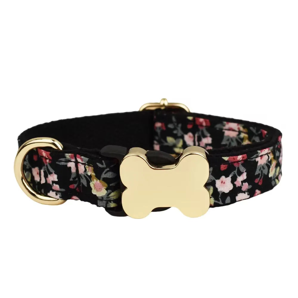 Flat nylon dog collar with a printed grid design and a bone-shaped metal buckle in assorted colours.