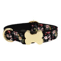 Flat nylon dog collar with a printed grid design and a bone-shaped metal buckle in assorted colours.