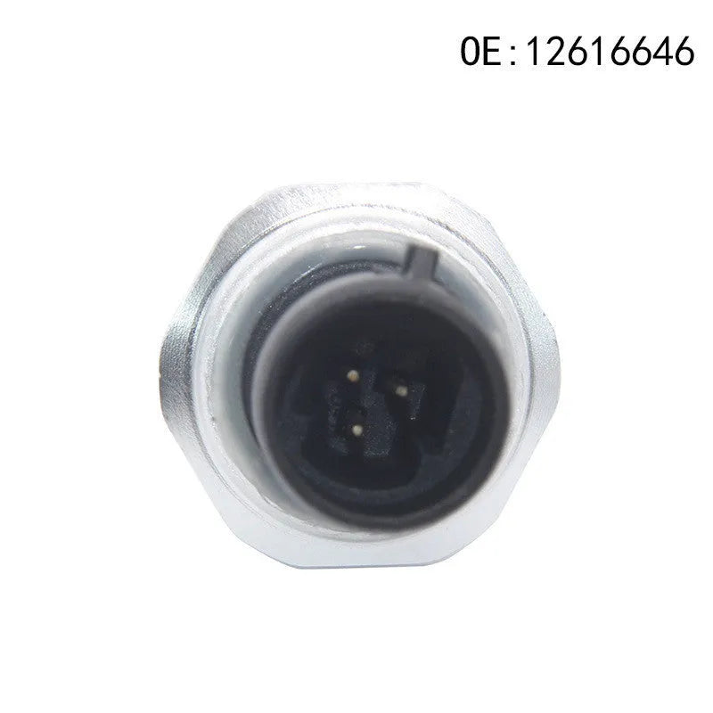 Silver metal fuel pressure sensor for automotive use, compatible with GM models.