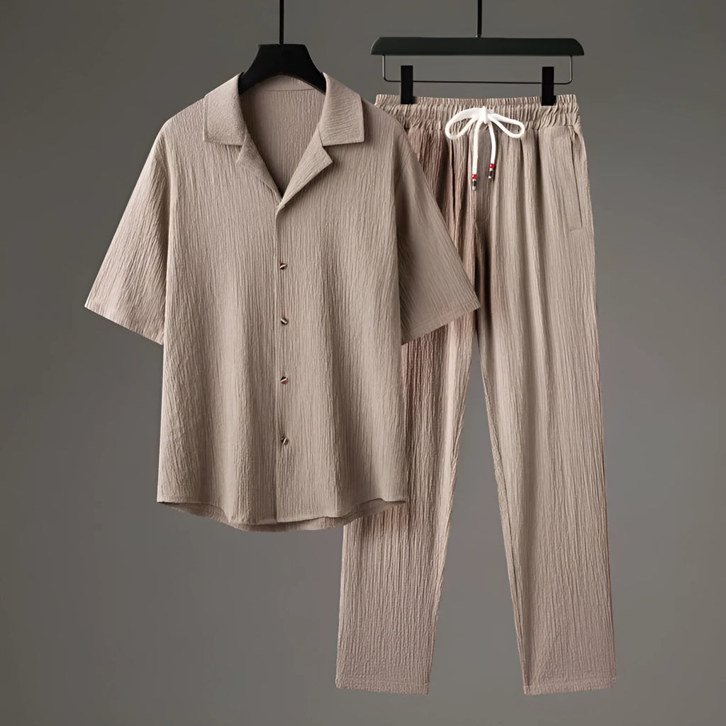 Men's grey Chinese-style casual two-piece sportswear set with short sleeve top and trousers on a hanger.