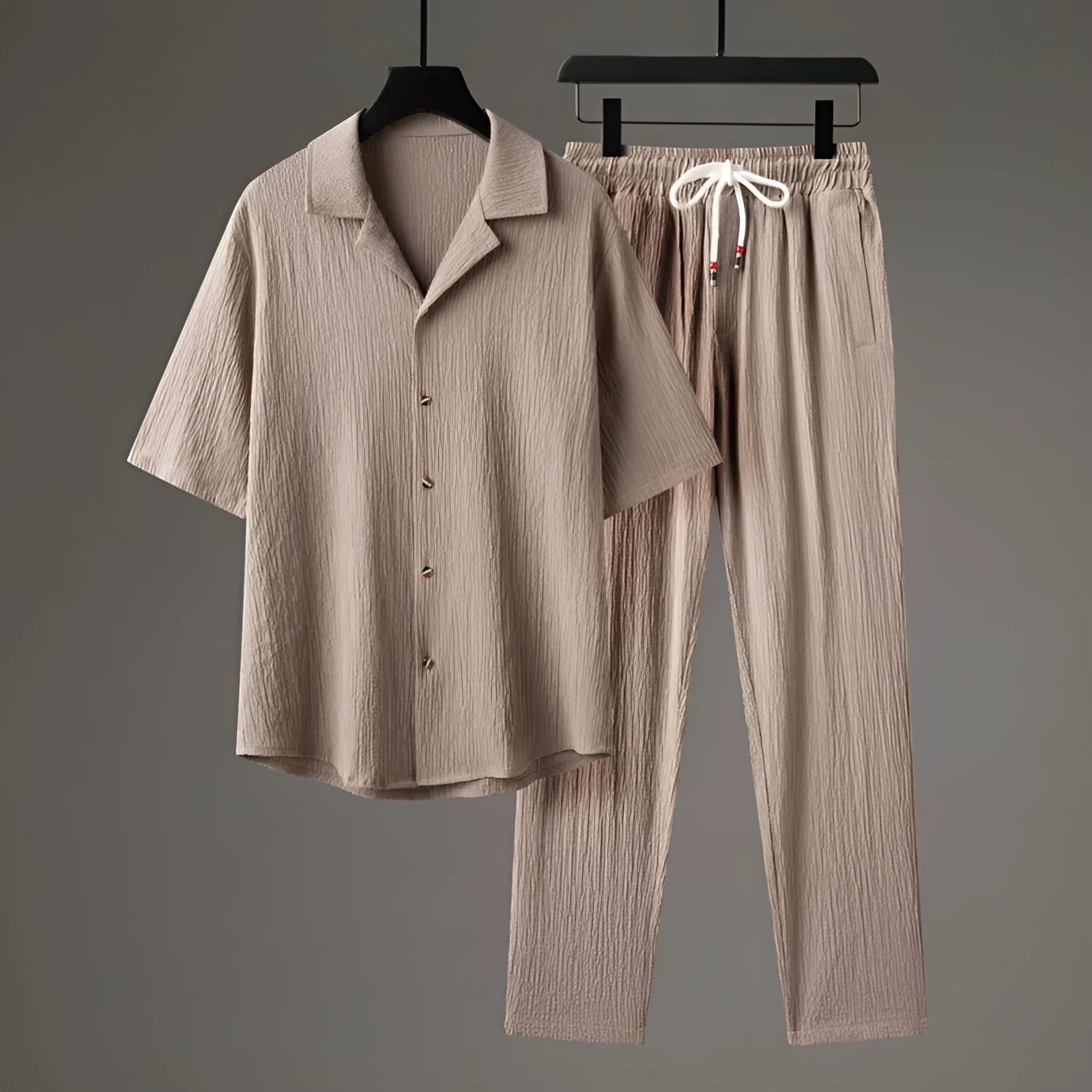 Men's grey Chinese-style casual two-piece sportswear set with short sleeve top and trousers on a hanger.