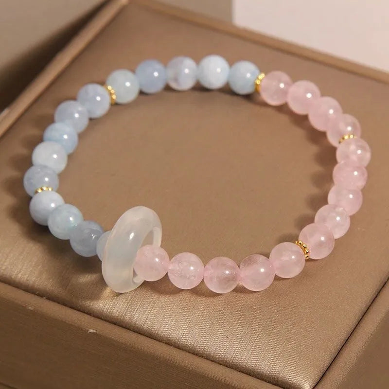 Women's aquamarine crystal bracelet with geometric beads in pink blue colour option