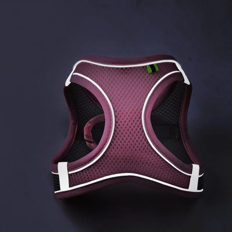 Reflective vest-style dog harness in breathable polyester with adjustable straps and rope leash
