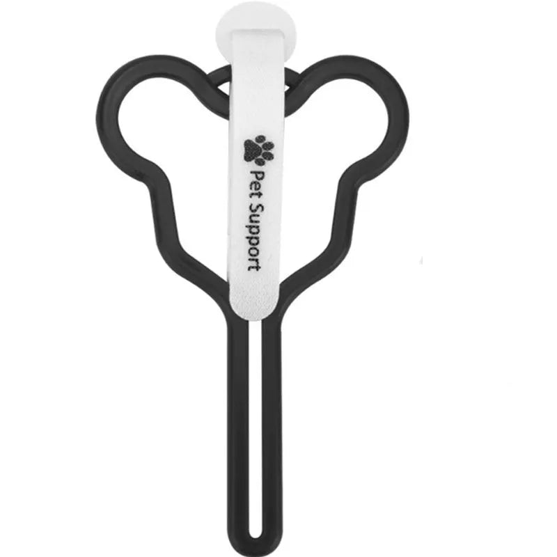A hands-free dog poop bag holder with a hook and loop fastener strap, shown attached to a dog leash.