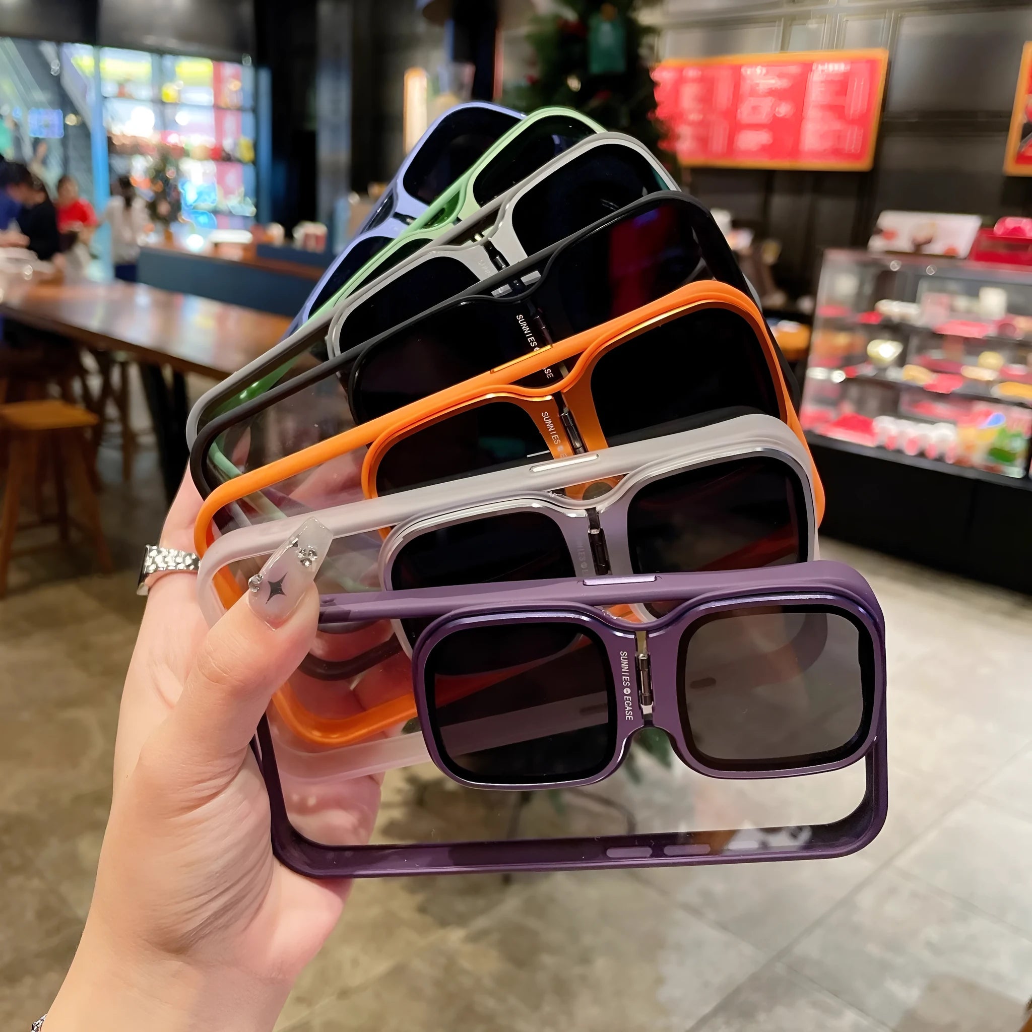 Lens drop protection high-permeability acrylic sunglasses holder phone case with invisible kickstand for iPhone