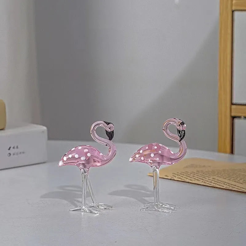Pink flamingo crystal decorative figurine on a white base for modern home table decor.