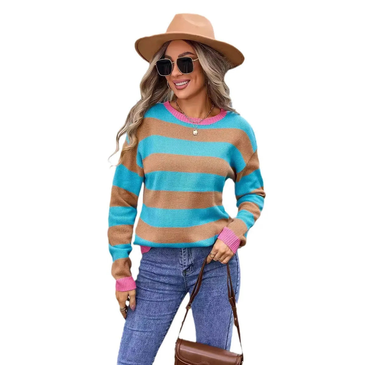 Women's loose fit long sleeve acrylic sweater in blue, showing round neck and regular sleeve.