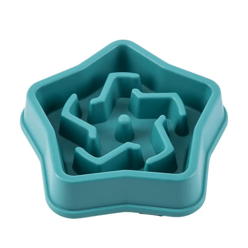 Yellow plastic slow feeding dog bowl with raised pet pattern at bottom