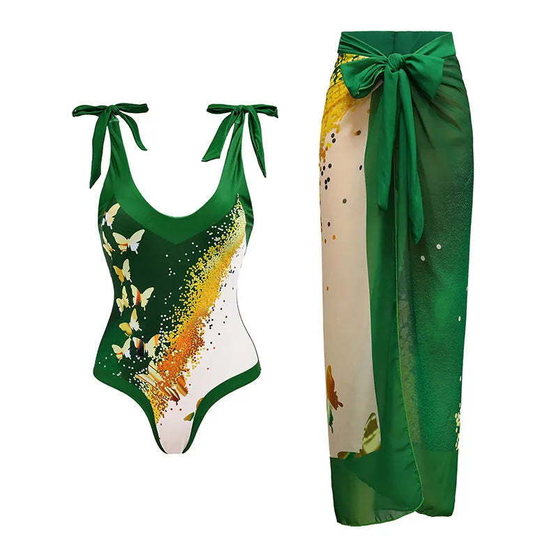Women's solid colour spaghetti strap one-piece swimsuit with a matching skirt laid flat