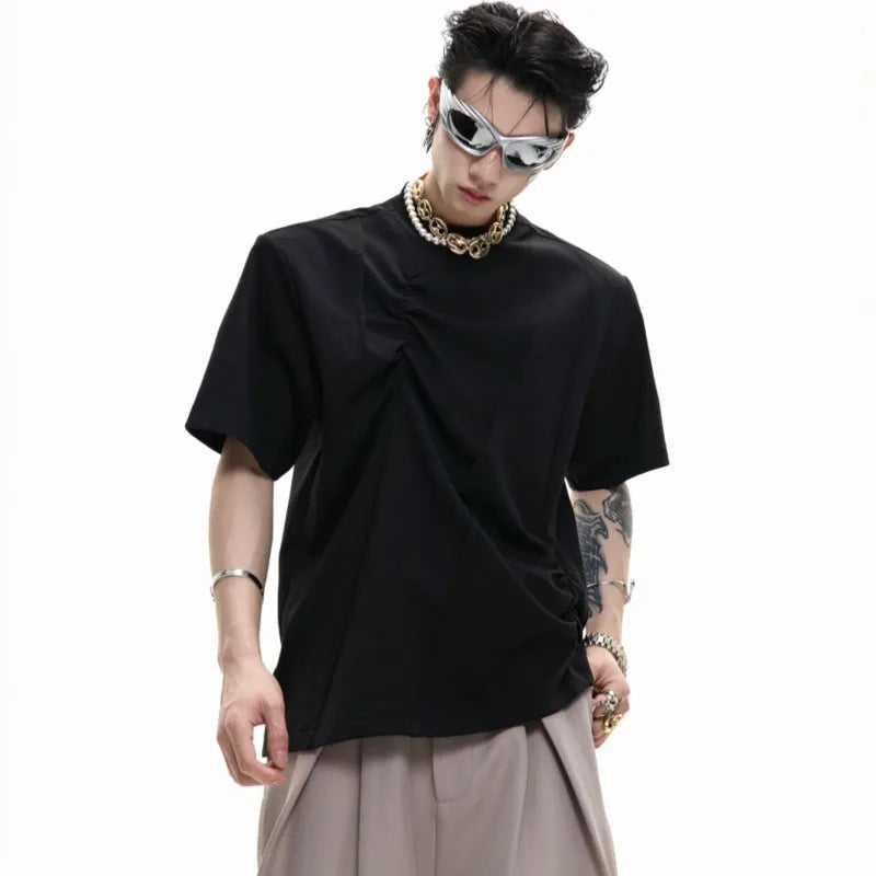Men's loose-fit grey cotton T-shirt with pleated asymmetric stitching detail on the front, round neck, short sleeves.