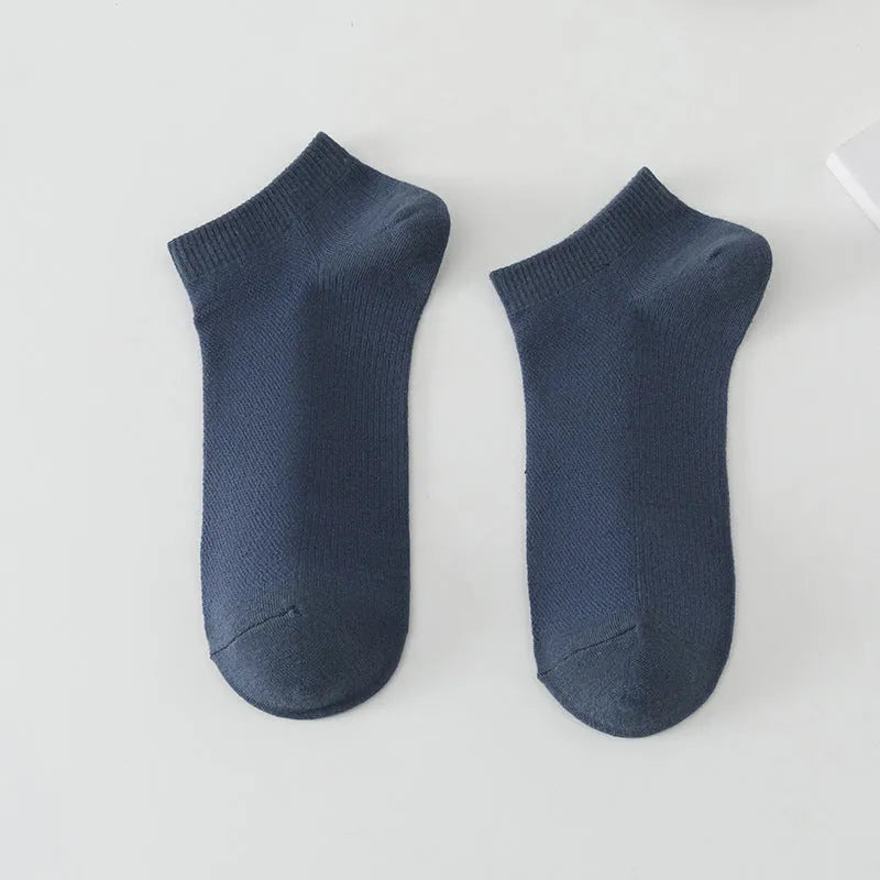 Men's solid colour polyester low-cut boat socks shown in multiple colour options