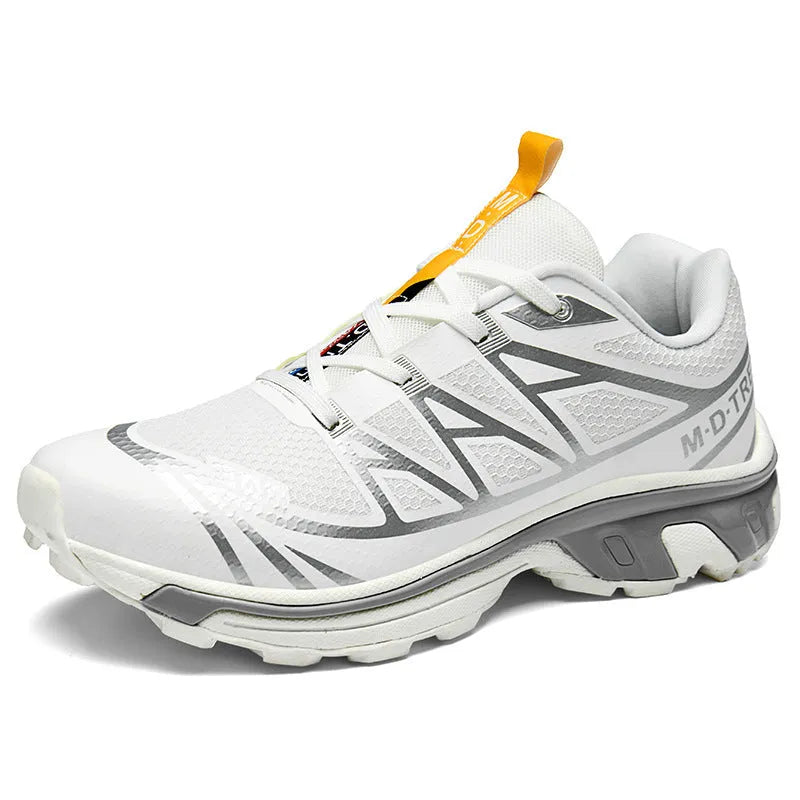 Low-top hiking shoes in artificial leather with mesh lining and a flat rubber sole.