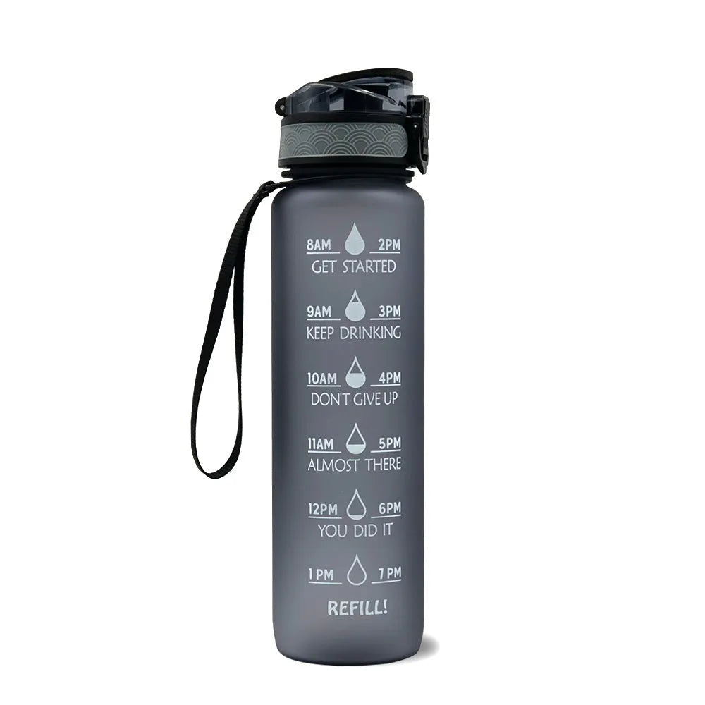 1000ml food-grade plastic sports water bottle, 29.5cm tall, in gradient blue-green colour.