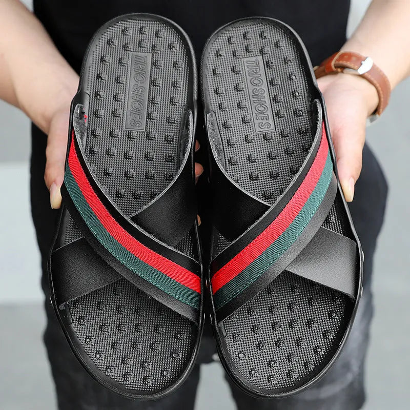 Men's cowhide leather flip-flops in black on a non-slip PU sole.