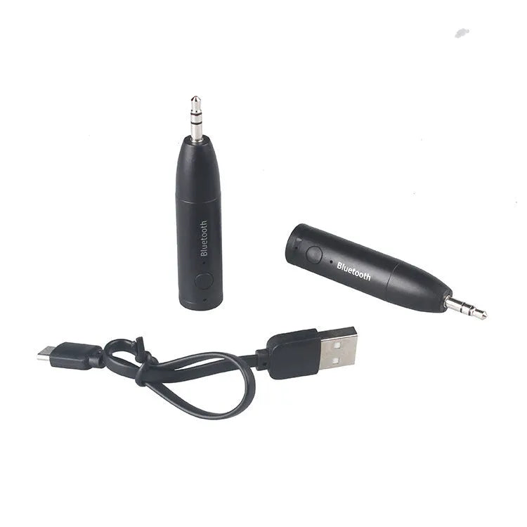 Black Bluetooth audio receiver with AUX connector and USB charging port